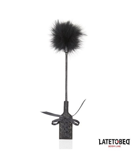 feather tickler and lace ribbon paddle