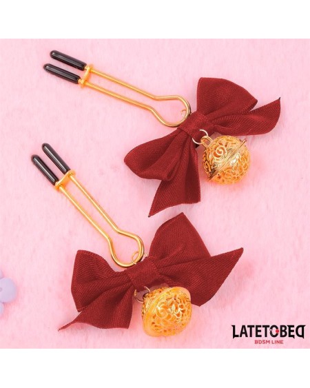 nipple clamps with red bow