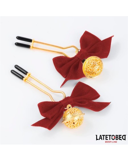 nipple clamps with red bow